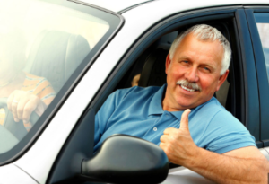 Happy driver giving thumbs up